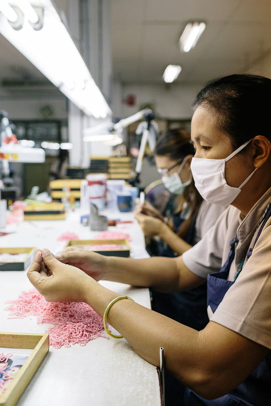 Worker in a sustainable jewelry factory 